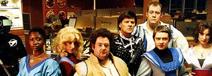 Still from Blake's Junction 7, featuring Johnny Vegas, Martin Freeman, and others