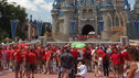 Gayday attendents, dressed in red, at Disney's kingdom