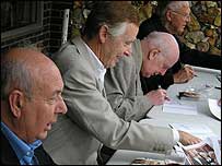 Director Harold Snoad (left) with the actors.