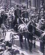 Horse and carriage in funeral procession
