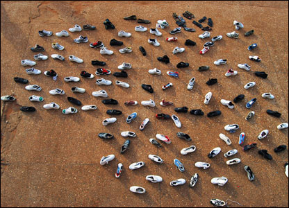 Ghana: Shoes for sale at the Mallam Atta market are displayed by an enterprising street seller in the shape of the continent. From Amasaba Abdul-Yakeen Aluizah, Accra
