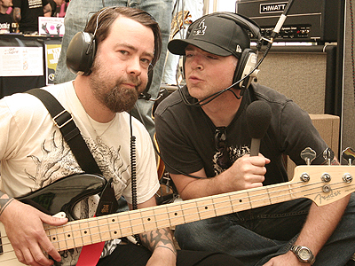 Mike puckers up to Dan