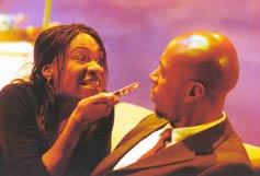 Image: Karen Bryson as Lebo Modise and Ewen Cummins as Richard Modise in On My Birthday