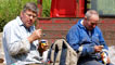 Men eating lunch on a farm (Image courtesy of J Lind)