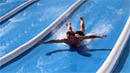 Man on water slide