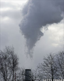 Smoke coming from incinerator chimney