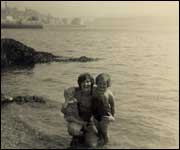 Jill (right) as a youngster on the beach