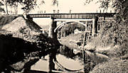 Bridge weakened by Japanese bombing. Forced to leave train and cross it by foot.