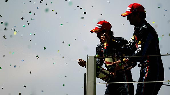 Sebastian Vettel and Mark Webber celebrate a Red Bull one-two at the Brazilian Grand Prix