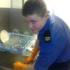 Dan washing dishes in the Navy