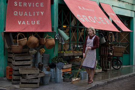 Alexandra Roach (young Margaret Thatcher) in a scene from The Iron Lady outside the family's business. Image: Pathé UK