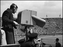 Someone filming a football match