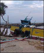 A boat destroyed by the tsunami