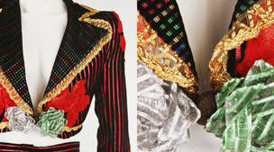 Spanish suit with bows|70|Elton John 