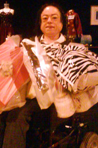 Liz Carr, weighed down with bags whilst Christmas shopping