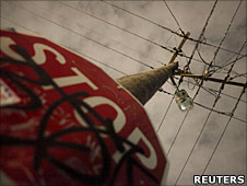 Power lines and stop sign
