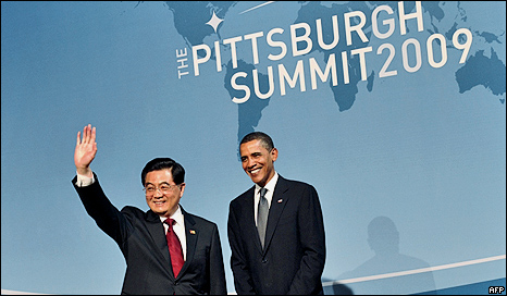 President Barack Obama stands with Chinese President China Hu Jintao (L) at the Pittsburgh G20 Summit (24 September 2009)