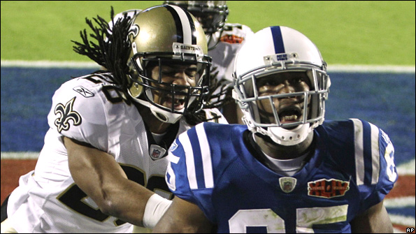 Pierre Garcon (Colts) and Usama Young (Saints) tussle in the SuperBowl 
