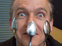 Martyn the cameraman, balancing one spoon on his nose