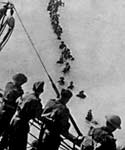 Troops queuing into the sea, waiting to be evacuated