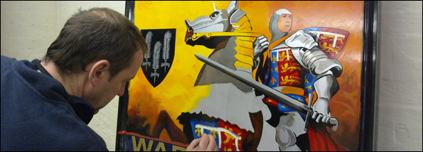 Pub sign being painted