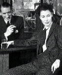 Photograph of a woman wearing a pin striped suit, 1941