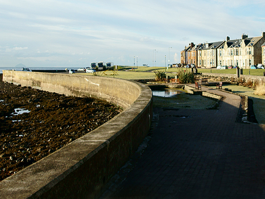 Colour view of pedestrian area of paving and grass at Troon Esplanade.