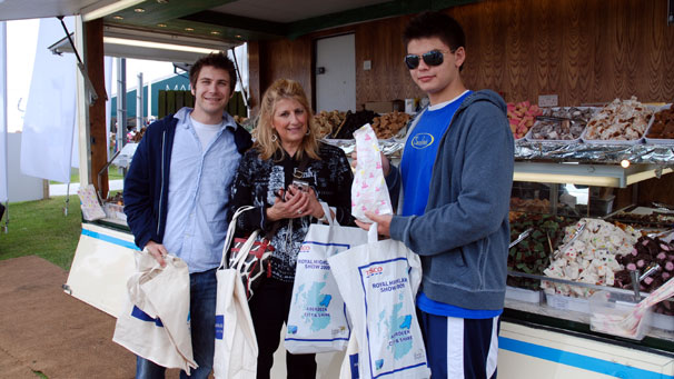 Laurie Decesaro and Drew Mattiace (right) have travelled from Rhode Island, USA, to celebrate Drew's brother David (left) graduation from St Andrews University. They are buying these sweets to take to family members back home.