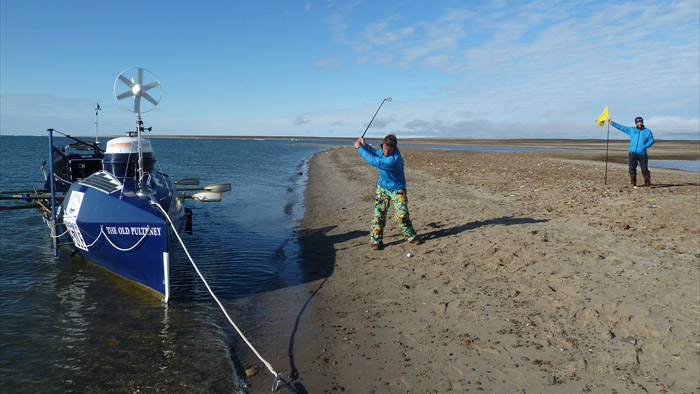 Billy playing golf on Cornwall Island