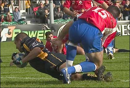 Shane Drahm dives for the line