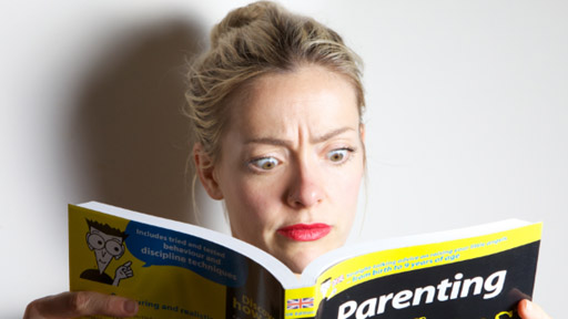 Cherry Healey reading a parenting book