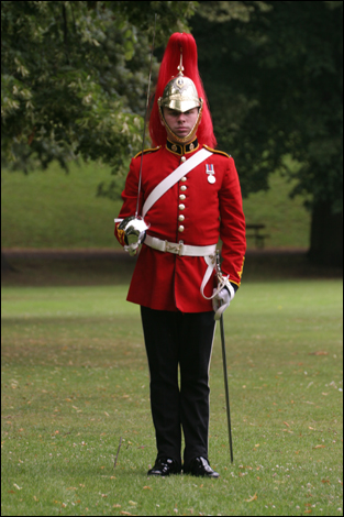 Lone guard at a parade by The Queen’s Dragoon Guards and B Company 1st Battalion, the Rifles on Castle Green in Hereford. 