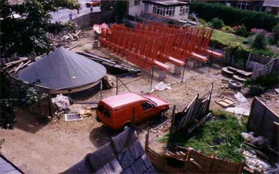 The Cubitt Patent Sails on the ground, next to the cap.