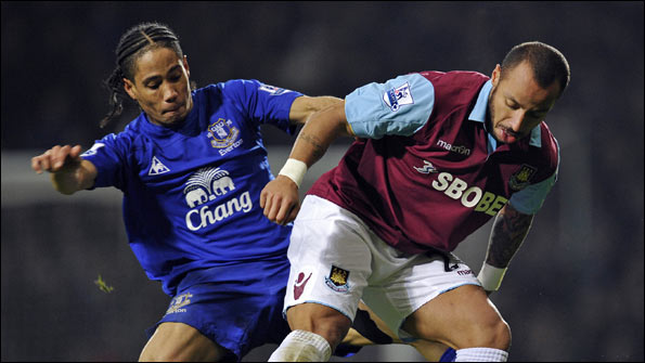 Everton's Stephen Pienaar tussles with Julien Faubert during the 1-1 draw with West Ham