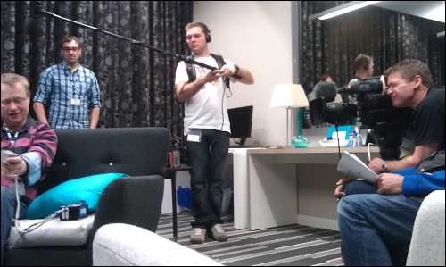 A film crew shoot R&D staff going about their business in their lab in MediaCityUK, Salford