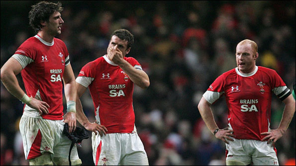 Luke Charteris, Jamie Roberts and Martyn Williams look glum after Wales are beaten on home soil