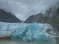 A glacier carves out a U-shaped valley