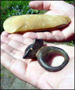 ring for holding the reigns of a Bronze Age chariot, and flint hand axe.