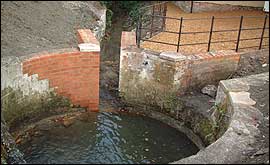 The sheepwash pool following restoration by villagers from Little Cheverell, near Devizes.