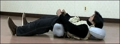 A man using a new airbag safety device for the elderly