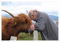 John Purser with Highland Cow