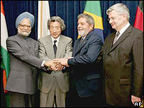 Singh, Koizumi, Lula, Fischer