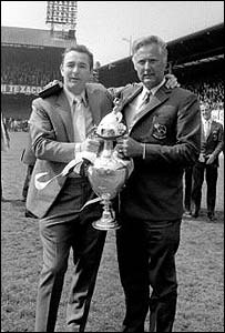 Clough and Taylor show off the Championship trophy