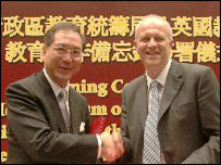 李国章（左）与拉梅尔