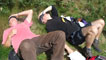 The crew lying down in the sun