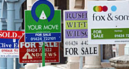 Homes for sale signs