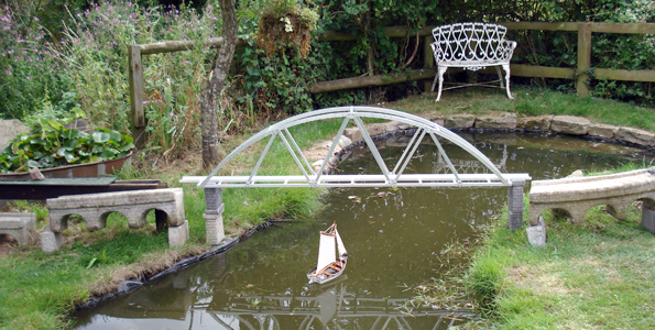 Pond and viaduct at Viv Hargreaves home in the Forest of Dean