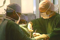 Surgeons in an operating theatre