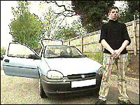 Sean Duffy in front of his car