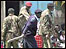 Police seek out Mungiki sect members in the Nairobi suburb , Muthare.